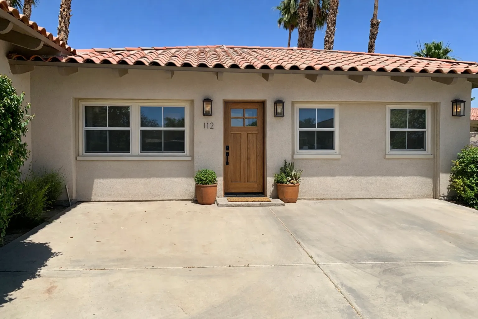 Attached garage converted into Junior ADU in Los Angeles featuring new private entrance and modern residential upgrade