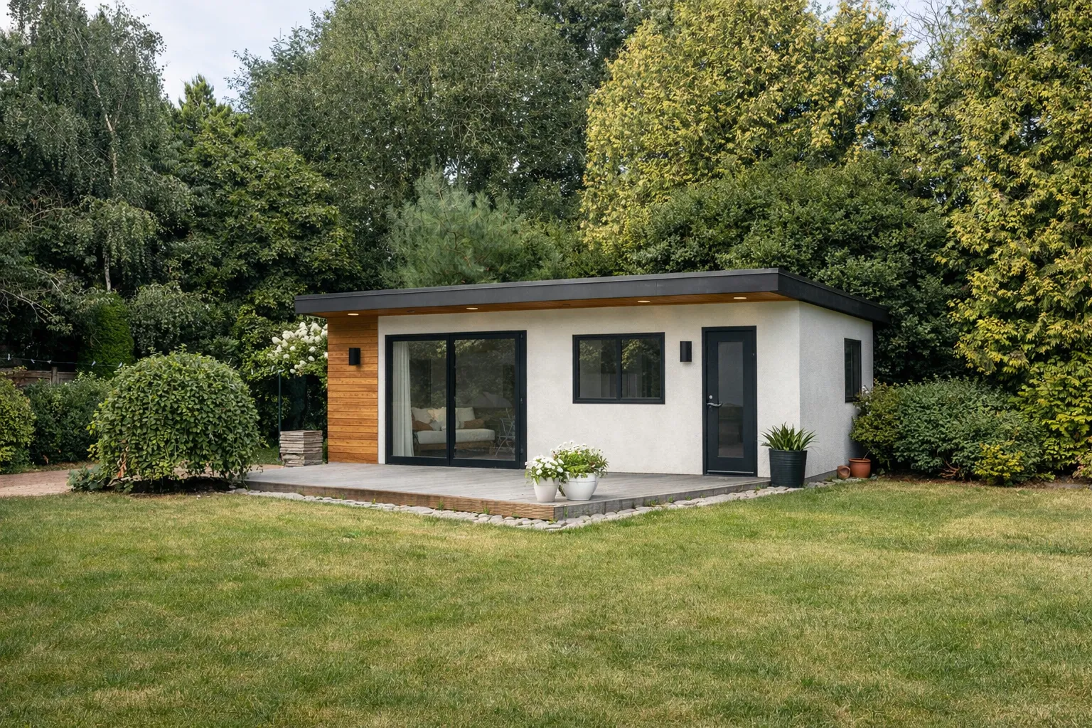Modernized backyard ADU remodel featuring contemporary exterior finish and upgraded sliding glass doors in Los Angeles
